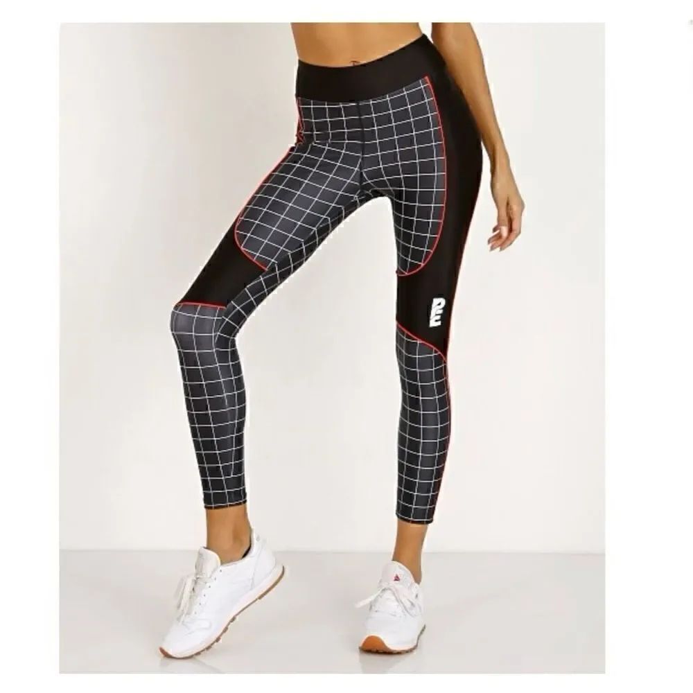 P.E Nation The Hammer Throw Legging Black/White Graph Paper Print Orange Piping